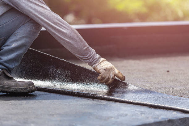 Professional Basement Waterproofing technician working in Arlington Heights, PA